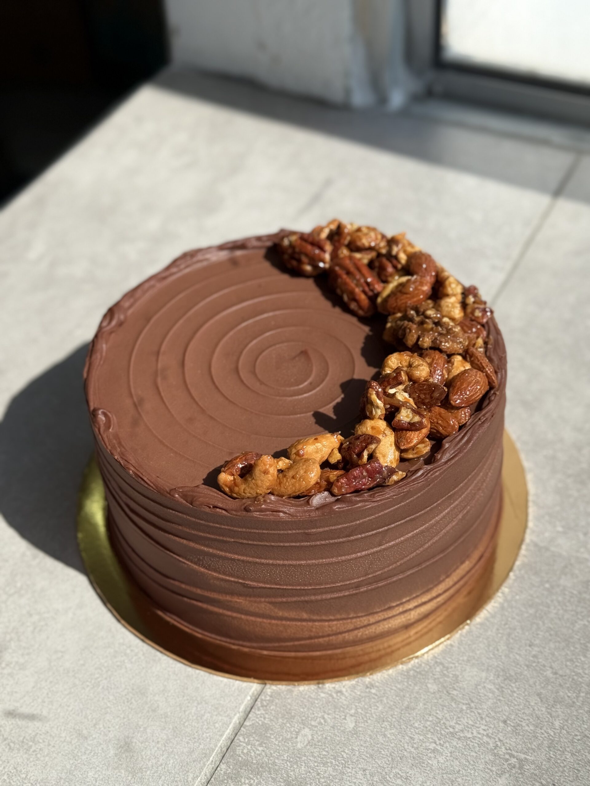 Raya Edition: Choc Fudge Cake with banana, nuts & salted caramel
